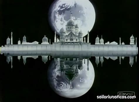 A Full Moon Reflecting In The Water With Buildings On It S Sides And A