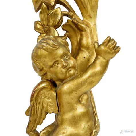 Fregio In Legno Scolpito E Dorato Ornato Da Putto Fiori E Foglie D