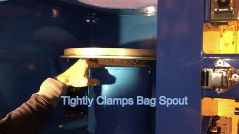 Bulk Bag Unloader Securing The Bag Spout With The Clamp It Feature