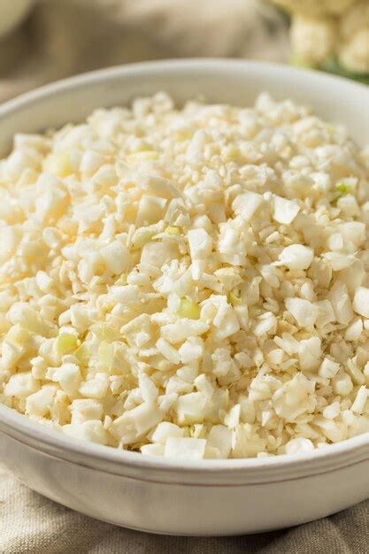 Premium Photo | Homemade organic raw cauliflower rice