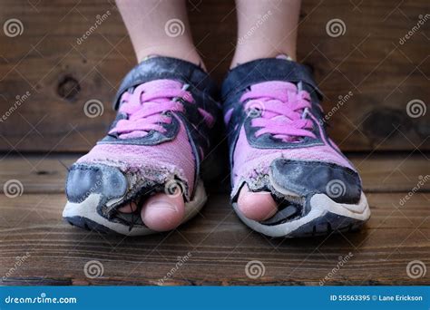 Child Shoes Holes Toes Sticking Out Stock Photo - Image: 55563395