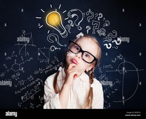 Small Child Mathematics Student Thinking On Background With Lightbulb