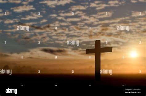 Silhouette Of Catholic Cross At Sunset Background Stock Photo Alamy