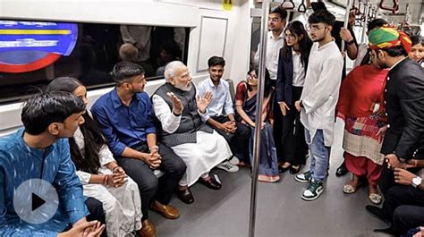 Watch Pm Modi Boards Metro To Visit Delhi University