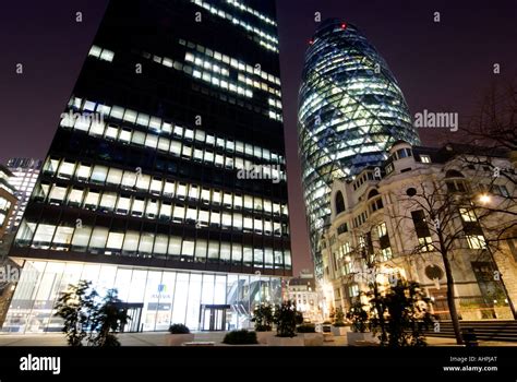 The Gherkin Illuminated At Night Stock Photo Alamy