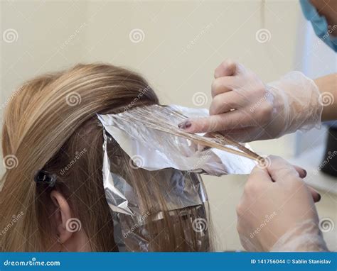 Foil on the Hair when Coloring the Hair. Stock Photo - Image of ...