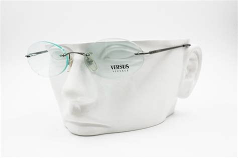 Versace Versus C21 Rimless Eyeglass Frame Graphite C Gem