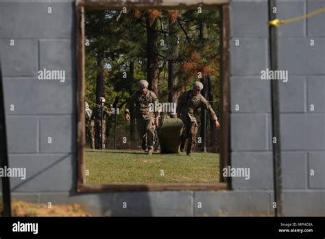 Us Army Rangers Pull A Skedco To An Obstacle At The Urban Assault