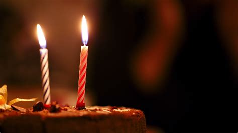 Candles on birthday cake 28284921 Stock Video at Vecteezy