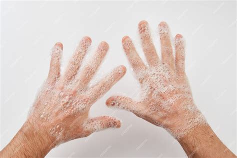 Premium Photo Man Washing Dirty Hands With Soap Close Up