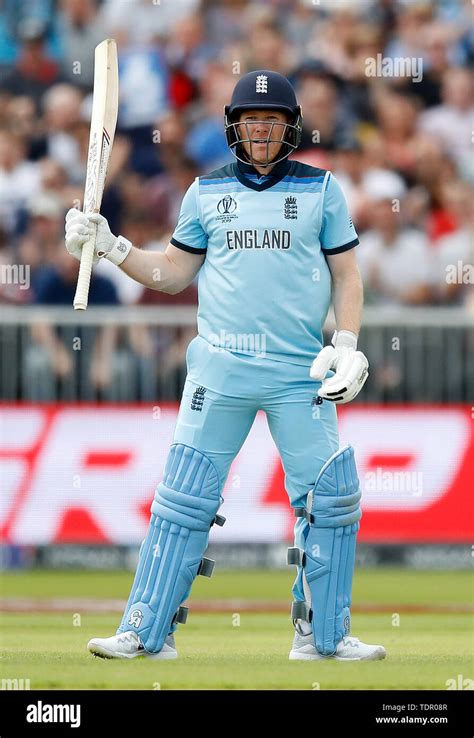 England's Eoin Morgan raises his bat after reaching fifty in batting ...