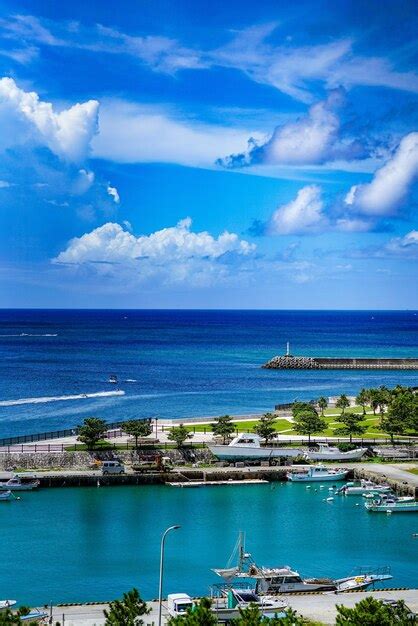 Premium Photo Scenic View Of Bay Against Blue Sky