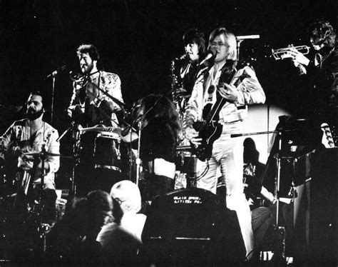 Black And White Photo Of Band Performing On Stage