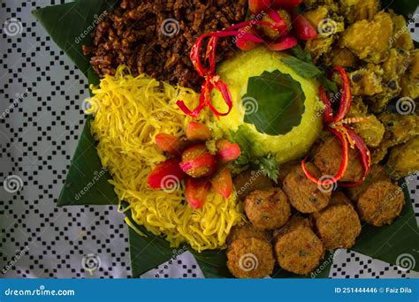 Nasi Kuning Or Yellow Rice Or Tumeric Rice Is Traditional Food From