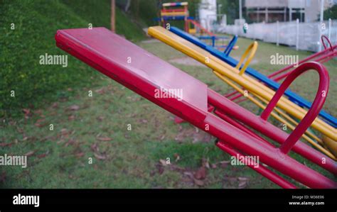 Four Colorful Seesaws At A Playground Stock Photo Alamy