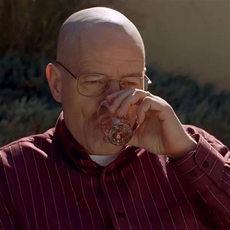 an older man drinking from a wine glass