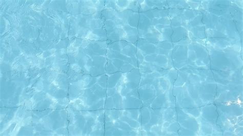 swimming pool waves. water wave on blue swimming pool. 24028046 Stock