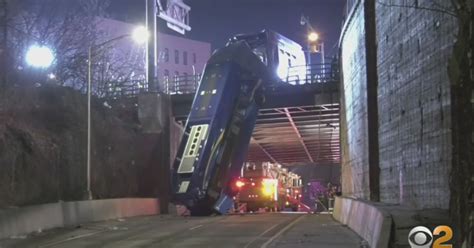 Shocking Scene Mta Bus Crashes Through Barrier And Dangles Over Cross