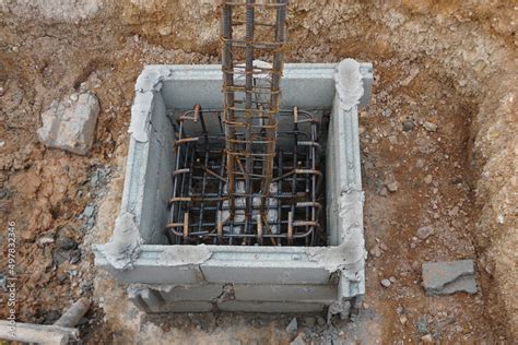 Steel Reinforced Concrete Columns And Footing In Block Concrete