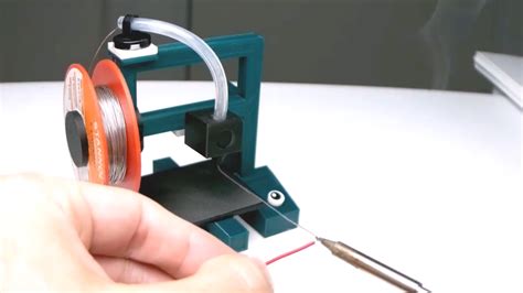 Whimsical Solder Stand Moonlights As Toy 3d Printer Hackaday