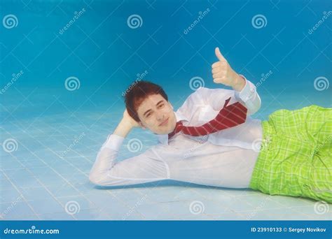 Businessman Underwater With Thumbs Up Stock Photos - Image: 23910133