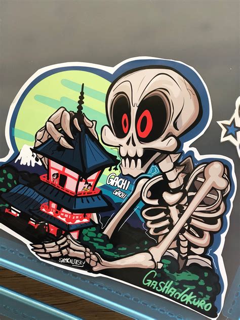 A Sticker Depicting A Skeleton Holding A Japanese Pagoda