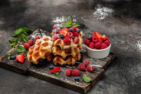 Belgian Waffles With Raspberries Strawberries And Blueberries Sugar