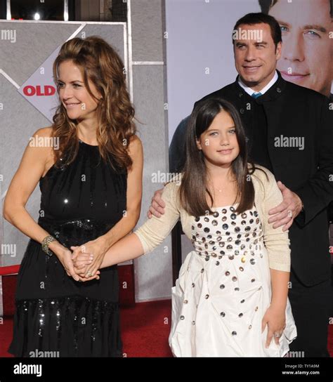 Actor John Travolta And Wife Kelly Preston Pose With Their Daughter