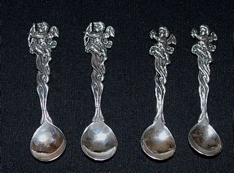 Antique: Four Sterling Silver Salt Spoons with Cherubs from midcoastfineantiquesofmaine on Ruby Lane