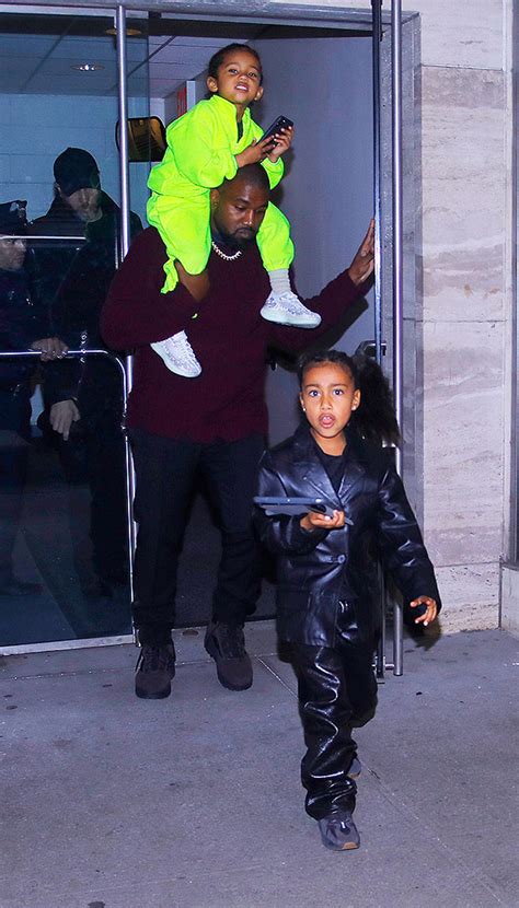 Saint West Goes For Ride On Dad Kanye West’s Shoulders — Cute Pics ...