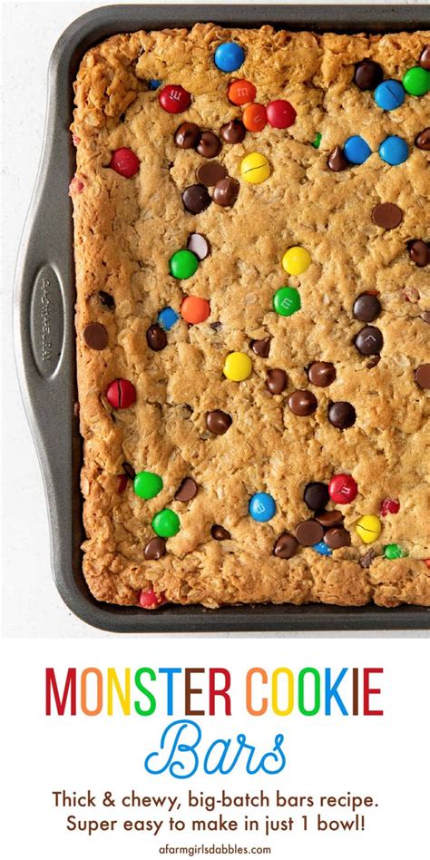 Monster Cookie Bars In A Baking Pan With The Words Monster Cookie Bars