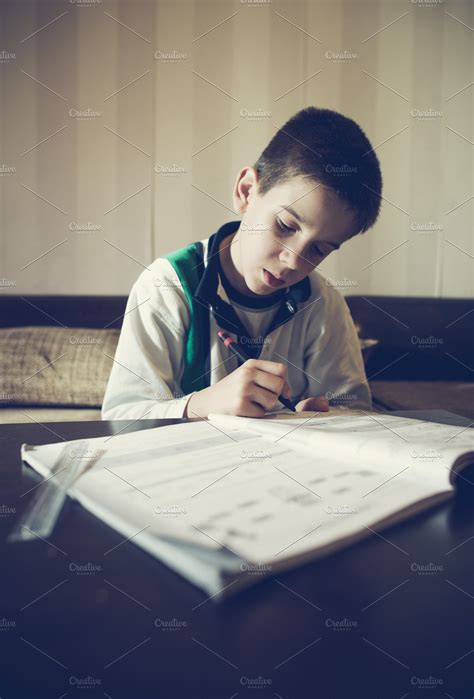 Child do his homework containing homework, child, and school | High-Quality Education Stock ...