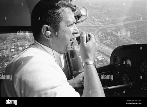 Francis Gary Powers Uses A Microphone To Report On Traffic For A Los