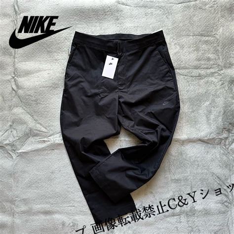 【未使用】格安送料 Xlサイズ （ 34 ）新品 Nike ナイキ クロップドパンツ チノパン テーパードパンツ ロゴ プリント 黒 ブラック Ll Dd7033 010の落札情報詳細