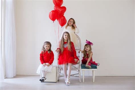 Girls with Red Heart-shaped Balloons on Birthday Party Stock Image ...