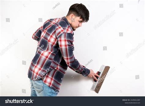 Repairman Builder Puttying White Wall Construction Stock Photo