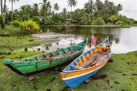 Premium Photo Boat Moored In Lake