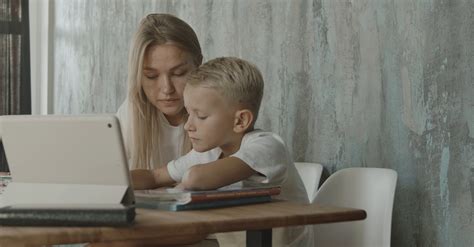 Mom Helping Son To Do His Homework Free Stock Video Footage Royalty Free 4k And Hd Video Clip