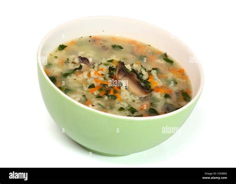 Rice Soup with Mushrooms and Spinach Stock Photo - Alamy