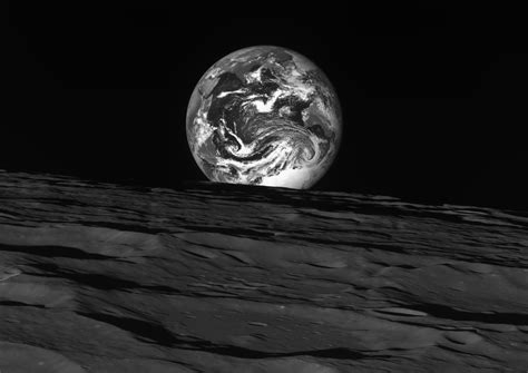 Magnificent Black & White Photos of the Earth Rising Over the Moon