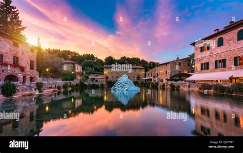 Thermal bath town of Bagno Vignoni, Italy during sunrise. Old thermal ...