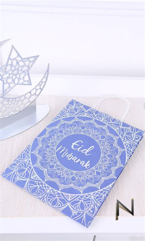 Sac cadeau en papier Eid Mubarak bleu nuit avec décorations argentées