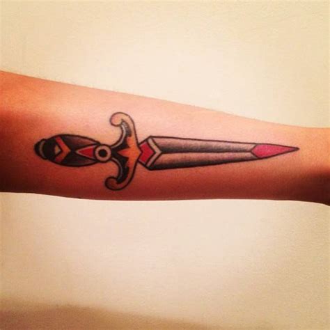 Traditional Style Dagger Tattoo Done On The Forearm