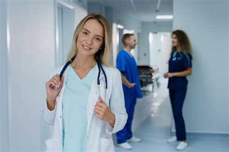 Premium Photo A Beautiful Nurse Looks Into The Camera Inside The