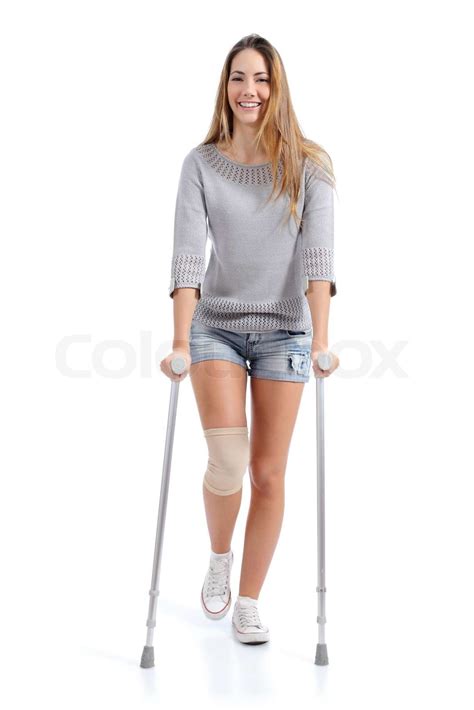 Front View Of A Woman Walking With Crutches Stock Image Colourbox