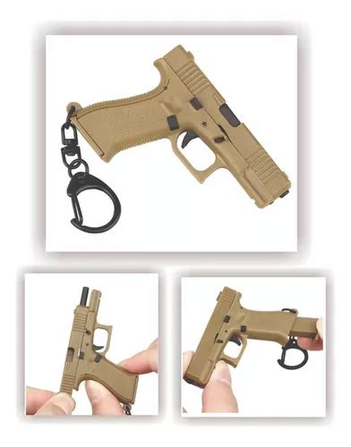 Chaveiro Pistola Arma Glock Carregador Funcional Cor Bege