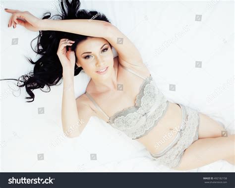 Sexy Beautiful Brunette Woman Lying Bed Stock Photo