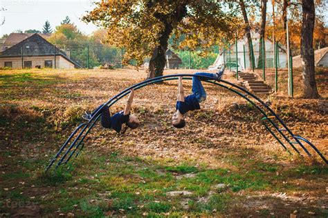 Carefree kids having fun on the playground at the park. 12087437 Stock ...