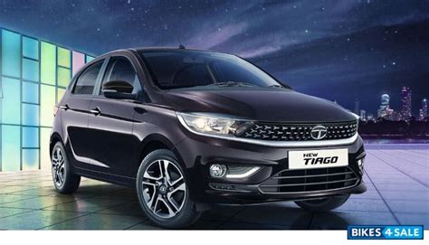 Tata Tiago Xt Rhythm Petrol Price Specs Mileage Colours Photos And