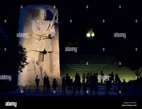 Tourists gather at night to visit the Martin Luther King Jr. Memorial ...